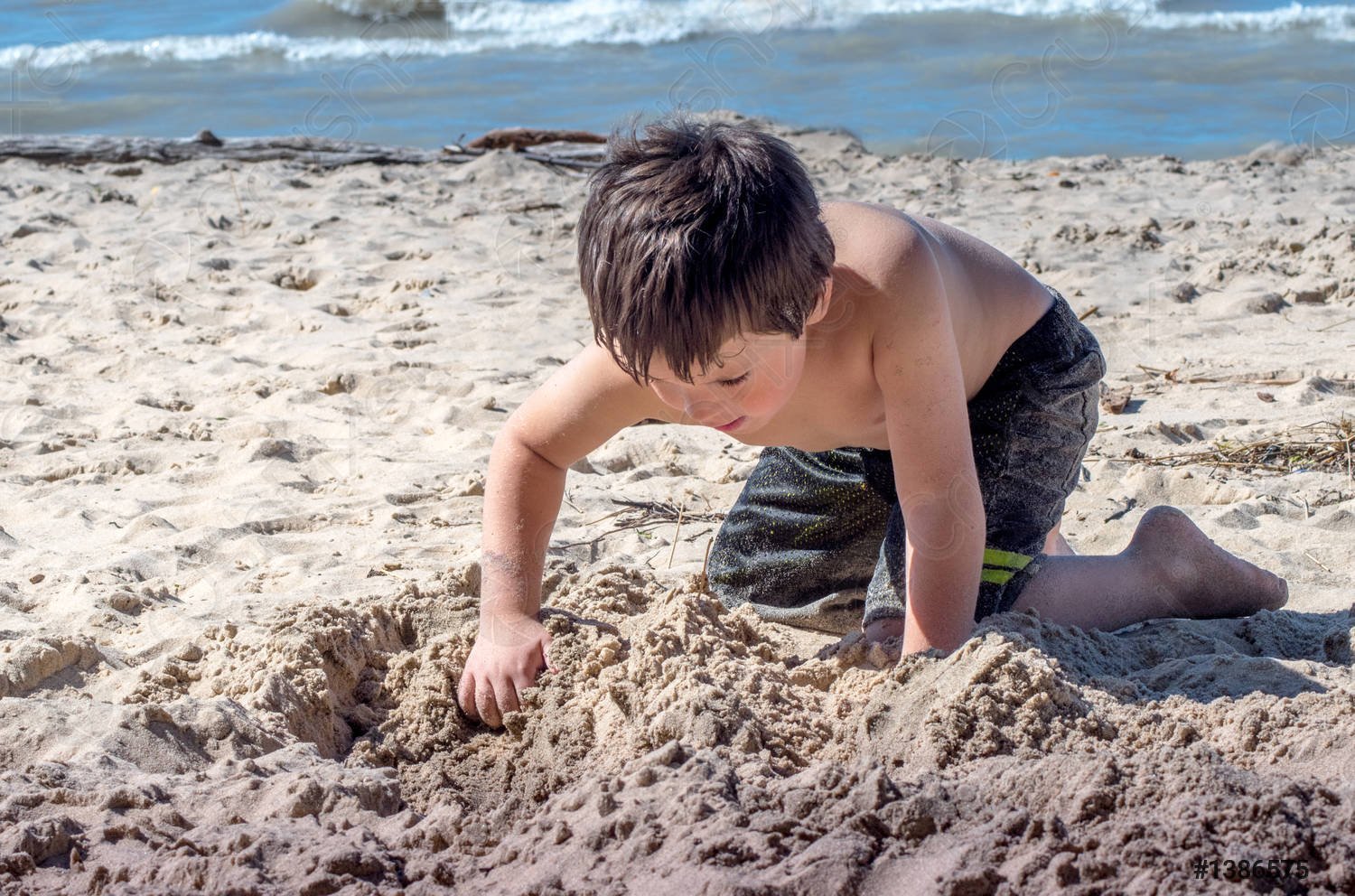 little-boy-digging-hole-china-1386575.jpg